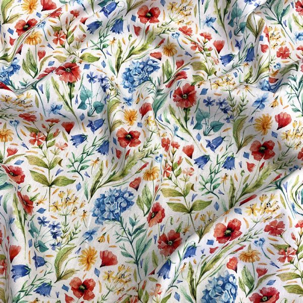 algodón estampado con flores silvestres de colores en estilo acuarelado sobre fondo claro