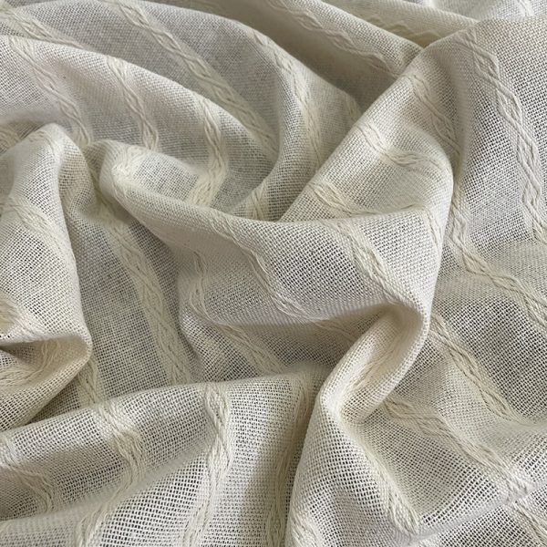 Tela manta Odalisca crudo con diseño trenzado artesanal en algodón 100%