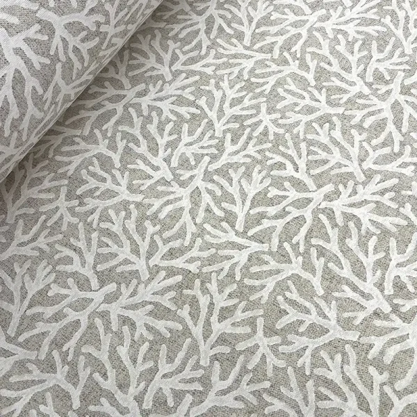 Tela de loneta con diseño de coral beige sobre fondo natural