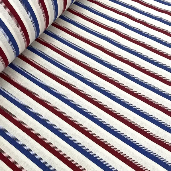 Tela loneta estampada con rayas diagonales en azul y rojo