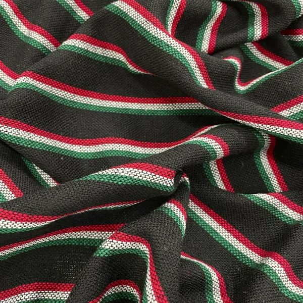 Tela cambaya con rayas tricolor en verde, blanco y rojo sobre fondo negro