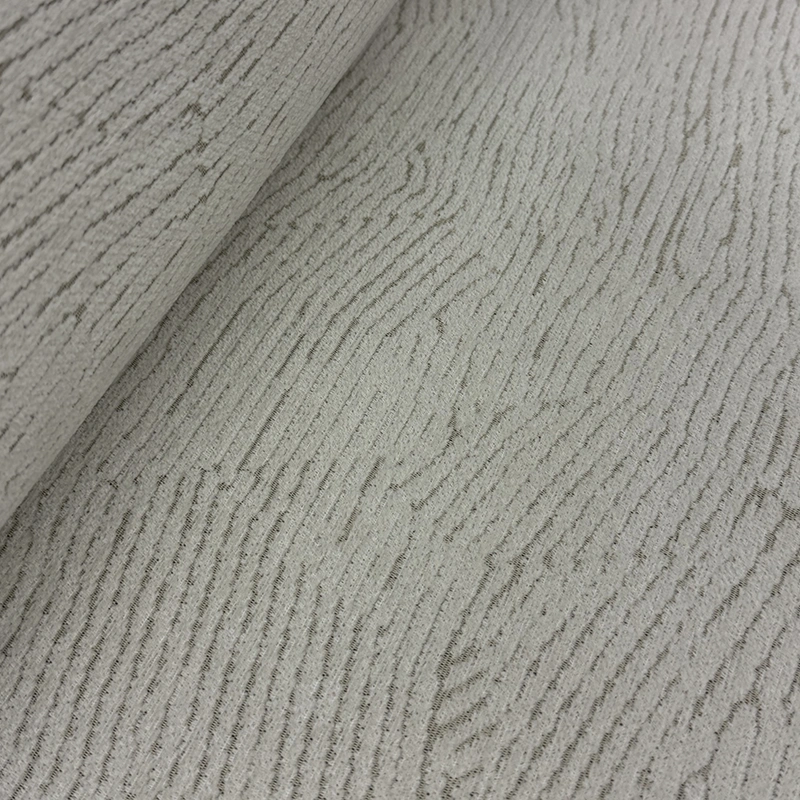 tela-para-tapizado-trazo-asimetrico-800x800 Primer plano de la Tela para tapizado Trazo Asimétrico, mostrando su patrón lineal asimétrico sobre un fondo textil gris de poliéster resistente para hogar.