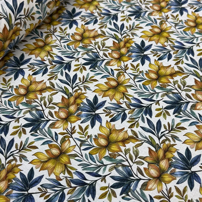 Tela Petite Flores Silvestres Amarillas con estampado digital botánico de flores ocres y hojas azules para costura creativa de ropa.