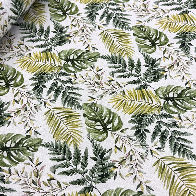 tela-petite-hojas-tropicales-verdes-monstera-fondo-blanco-800x800 Tela Petite Hojas Tropicales y Monstera de la image_6c4825.jpg con estampado digital de costilla de Adán y helechos en color verde sobre fondo blanco texturizado.