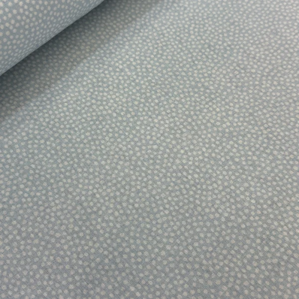 Tela Petite Lluvia de Puntos Azul con estampado digital de lunares blancos diminutos para costura creativa de ropa y fundas.