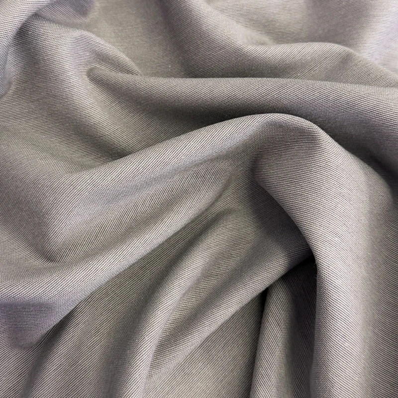 loneta-trim-gris-piedra-800x800 Loneta Trim Gris Piedra de diseño liso y tonalidad gris cálida, ideal para cortinas, tapicería, fundas, manteles y decoración del hogar.