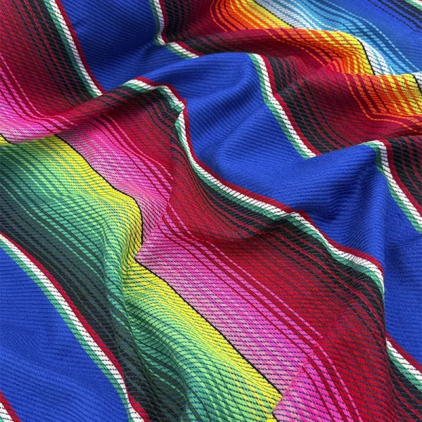 Cambaya Saltillo Azul con fondo azul intenso y rayas multicolor de inspiración mexicana.