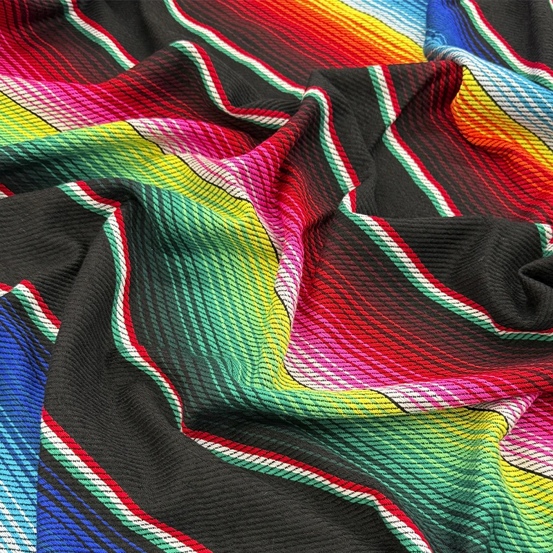 cambaya-saltillo-negro-800x800 Cambaya Saltillo Negro con fondo negro y rayas multicolor de inspiración mexicana.