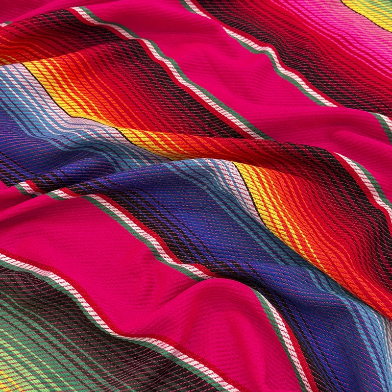 cambaya-saltillo-rosa-800x800 Cambaya Saltillo Rosa con fondo rosa intenso y rayas multicolor de inspiración mexicana.