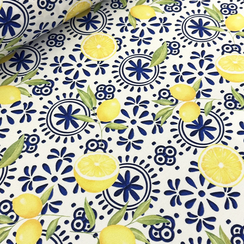 genova-170-limones-flores-azules-fondo-blanco-800x800 Genova 170 Limones y Flores Azules con limones amarillos, hojas verdes y motivos florales azules sobre fondo blanco.